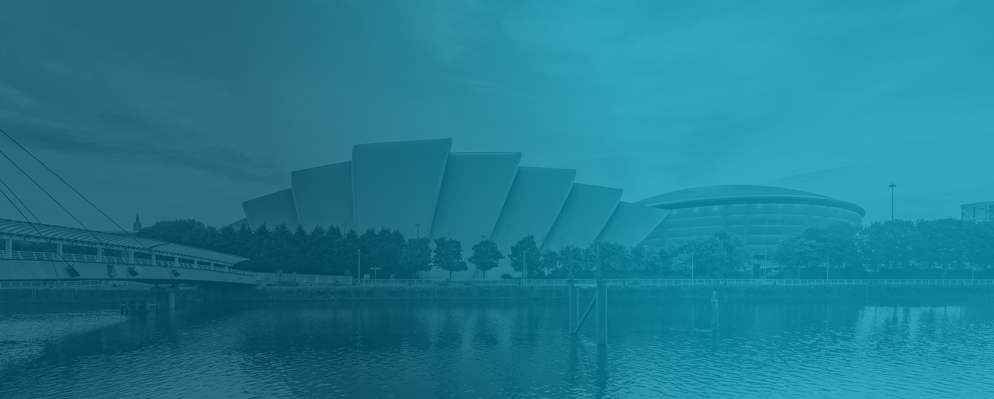 A scenic landscape by Harper McDermott depicts rolling green hills and distant mountains under a cloudy sky, with a winding path leading through the terrain.